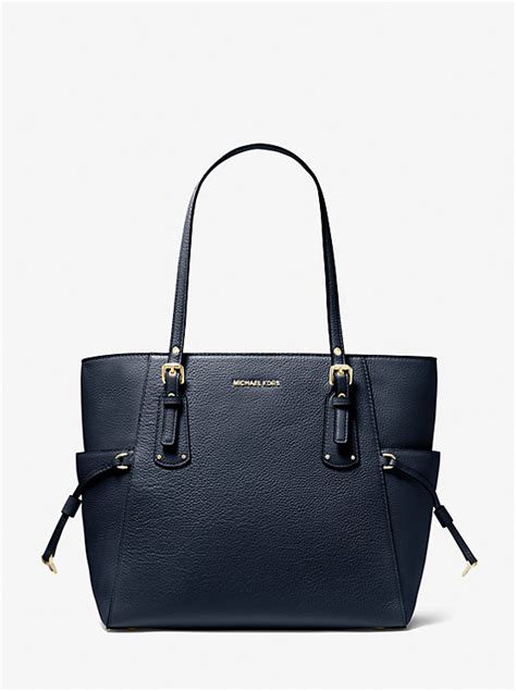what kind of bags are similar to michael kors voyager